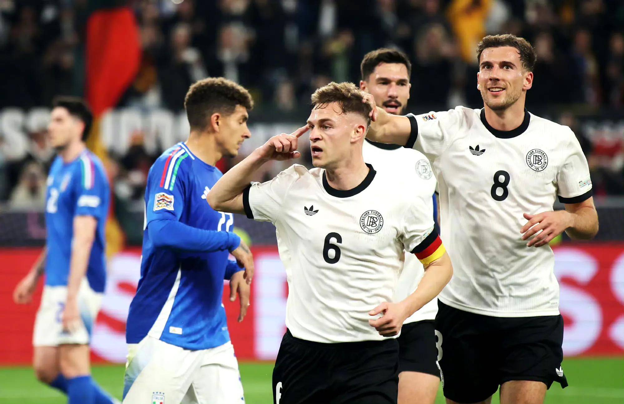 德国队在主场击败罗马尼亚队，稳健表现