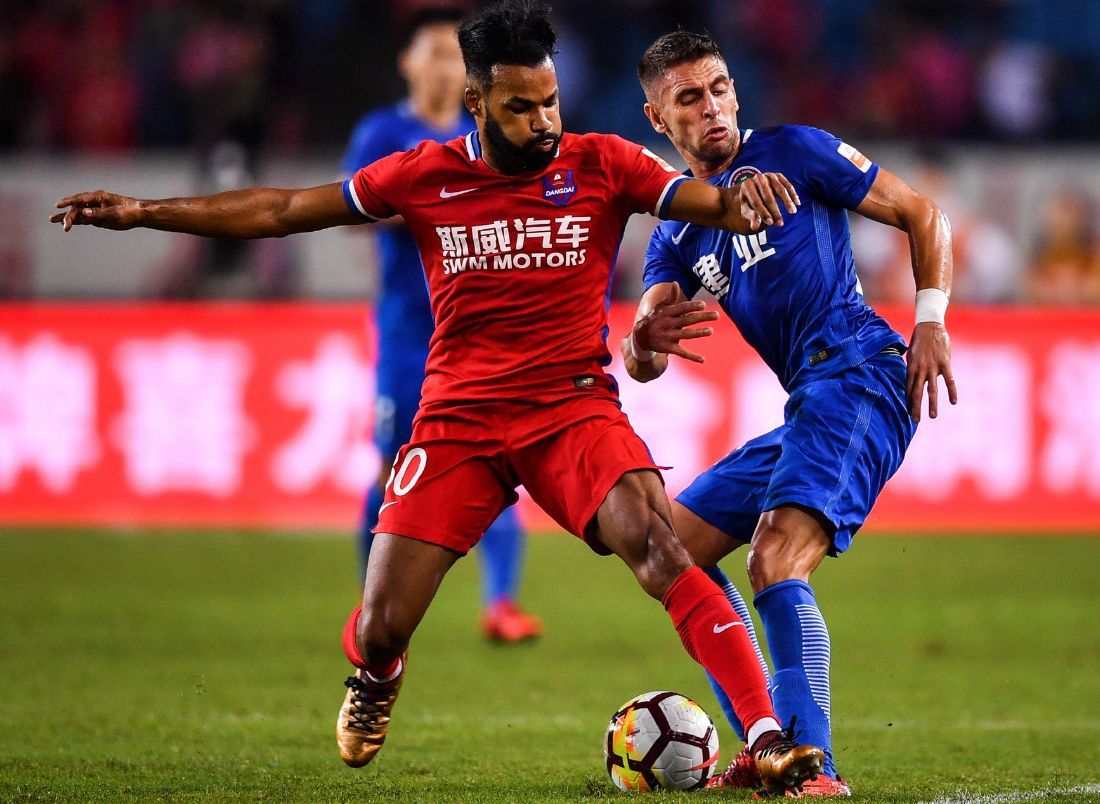 恒大客场战平上港，保持不败战绩，领跑榜首